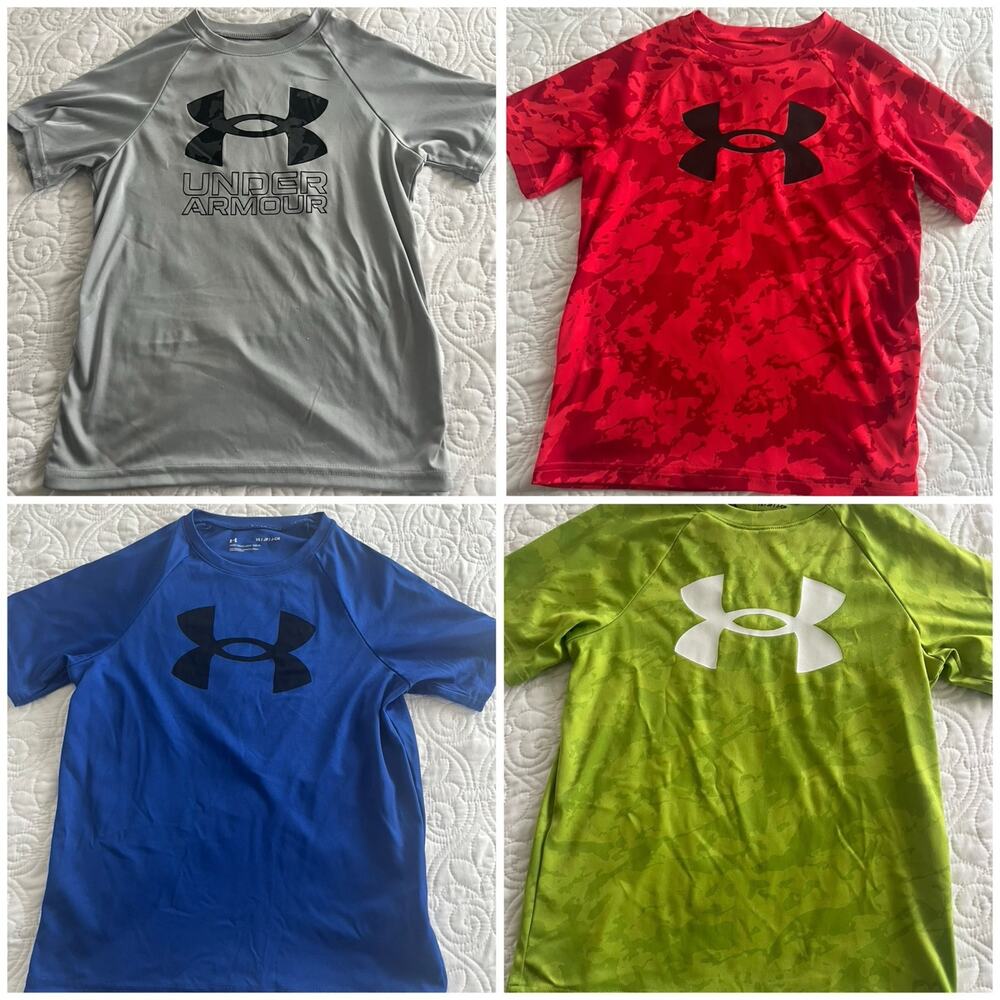 Under Armour four pack size youth small shirts